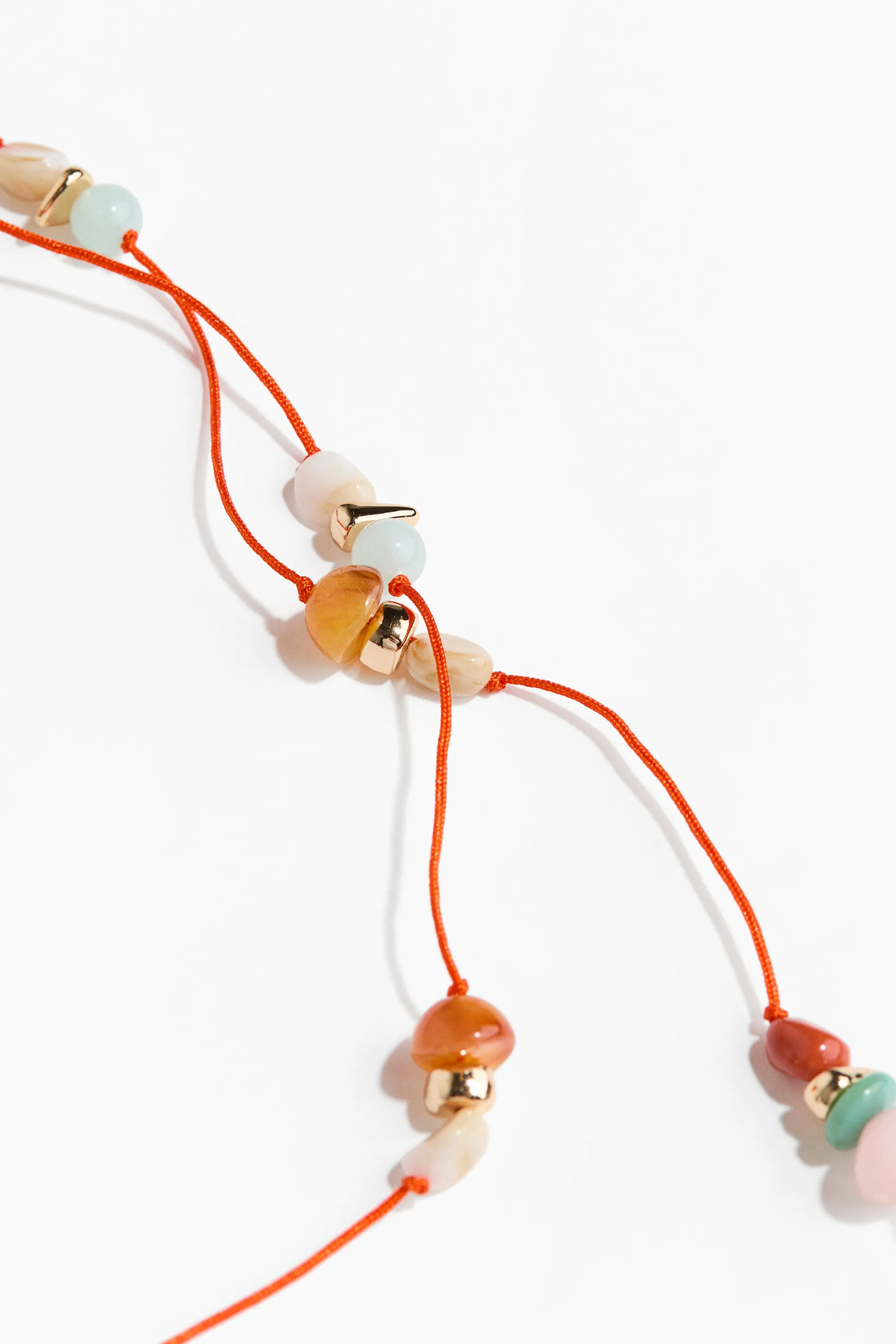 Collier cordon avec perles fantaisie - Orange vif/marbré