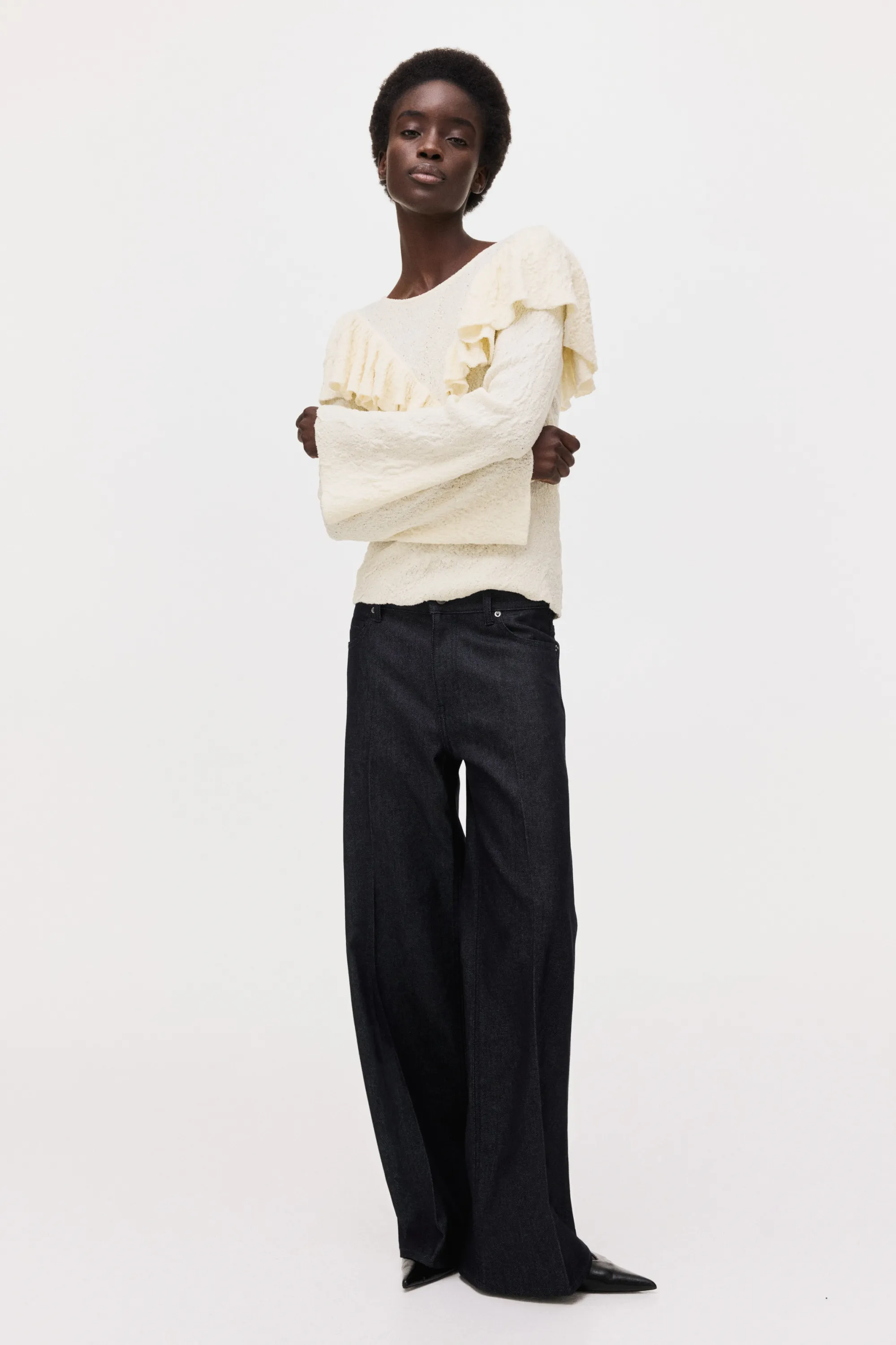 Textured-knit frill-trimmed top - Crème