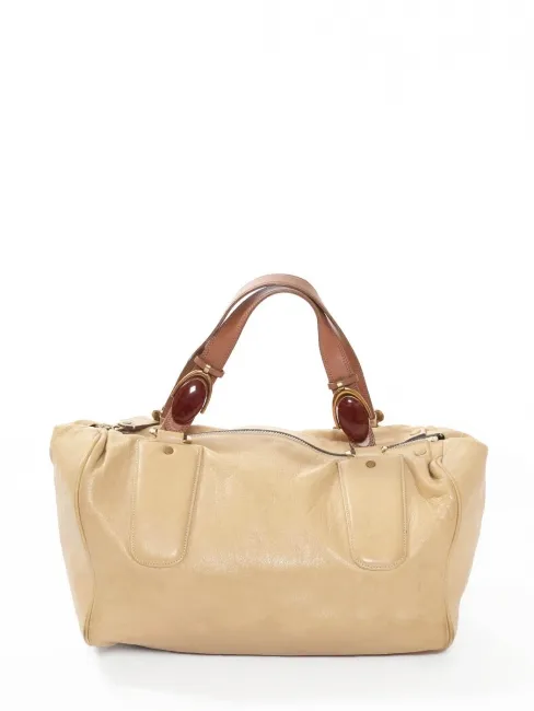 Sac duffle bag en cuir beige, anse marron noisette et pierre rouge bordeaux Px boutique 1500€
