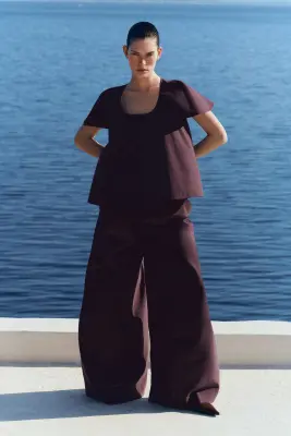 PLEATED MODAL WIDE-LEG TROUSERS - ROUGE PROFOND — photo 5
