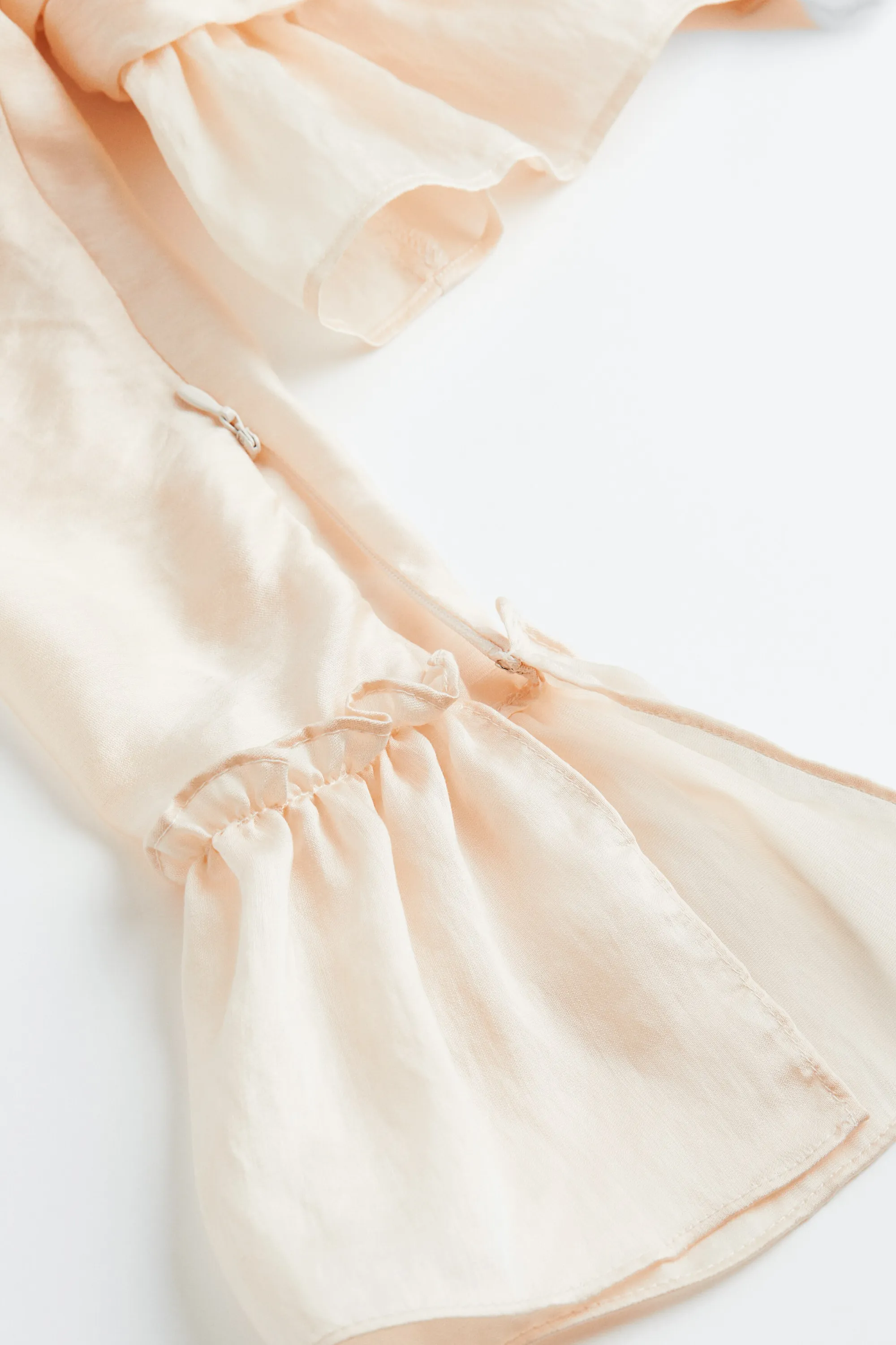 Blouse péplum courte avec manches bouffantes - Beige poudré clair