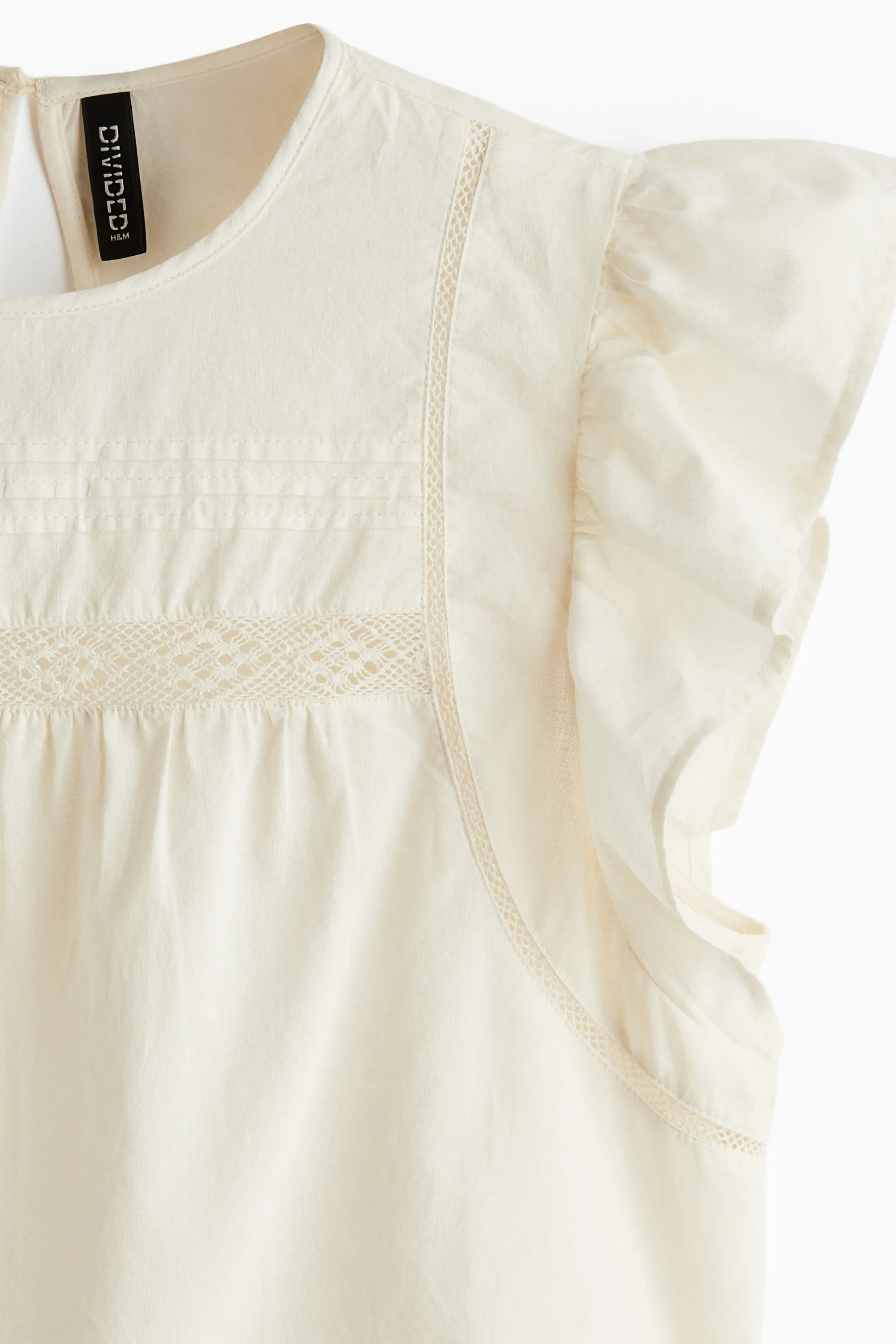 Blouse péplum avec dentelle - Crème
