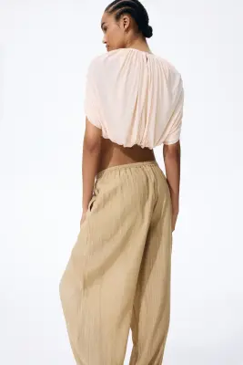 Crinkled balloon trousers - Beige — photo 1