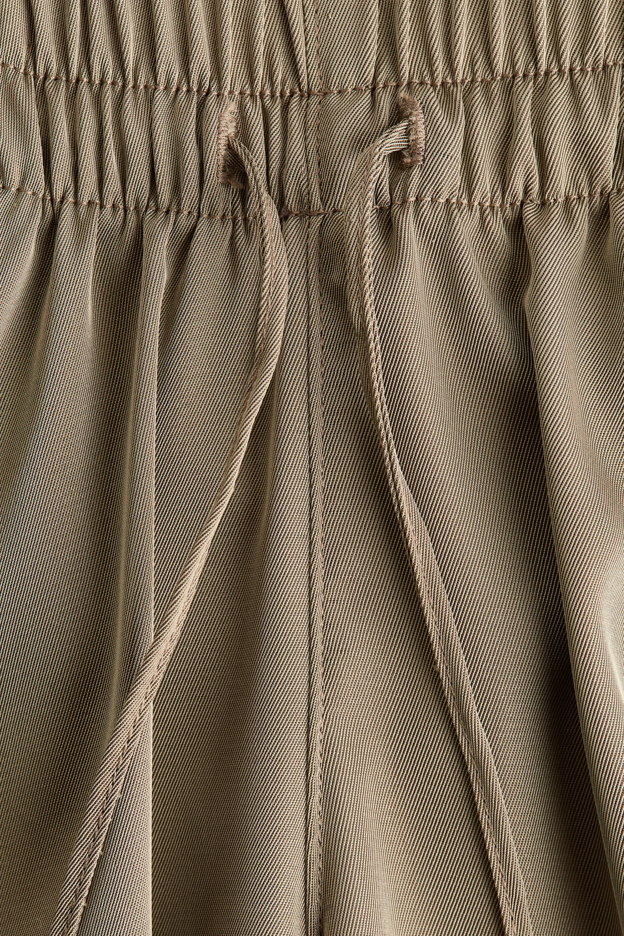 MAMA Pantalon à cordon en denim avec jambes larges - Vert kaki clair