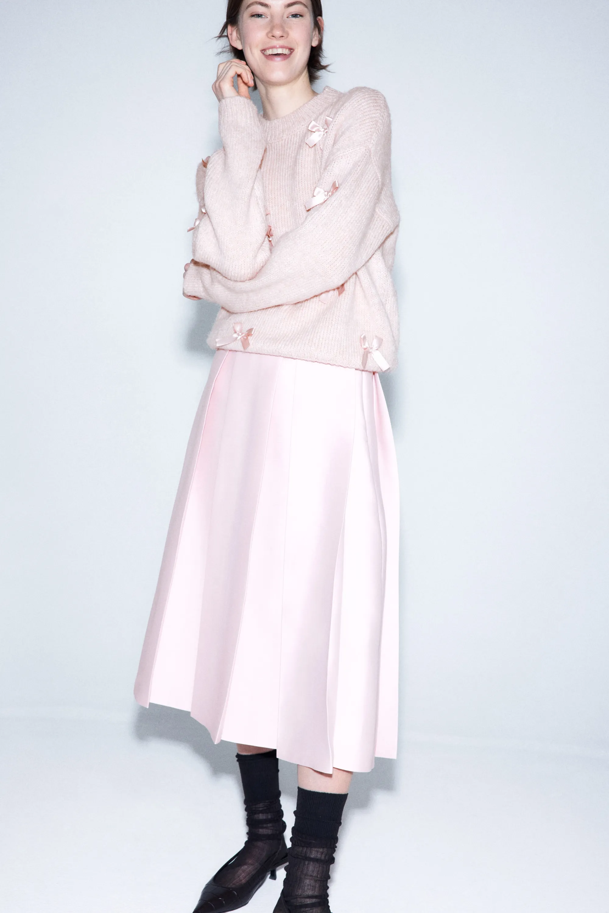 Pull avec nœuds appliqués - Rose clair
