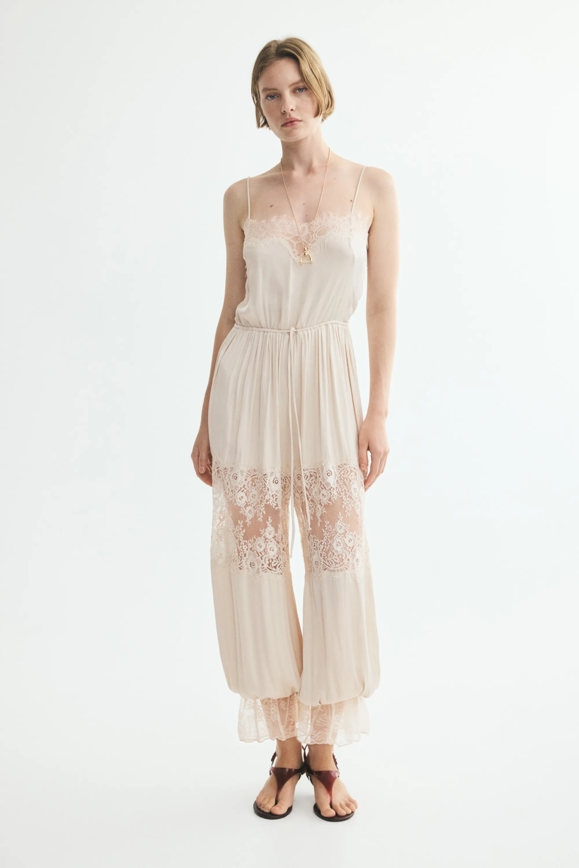 Combi-pantalon à jambes ballon avec dentelle - Beige clair/crème