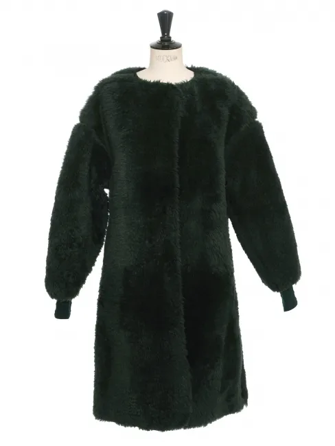 Manteau shearling en peau retournée vert foncé Prix boutique 6650$ Taille 36