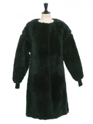 Manteau shearling en peau retournée vert foncé Prix boutique 6650$ Taille 36 — photo 1