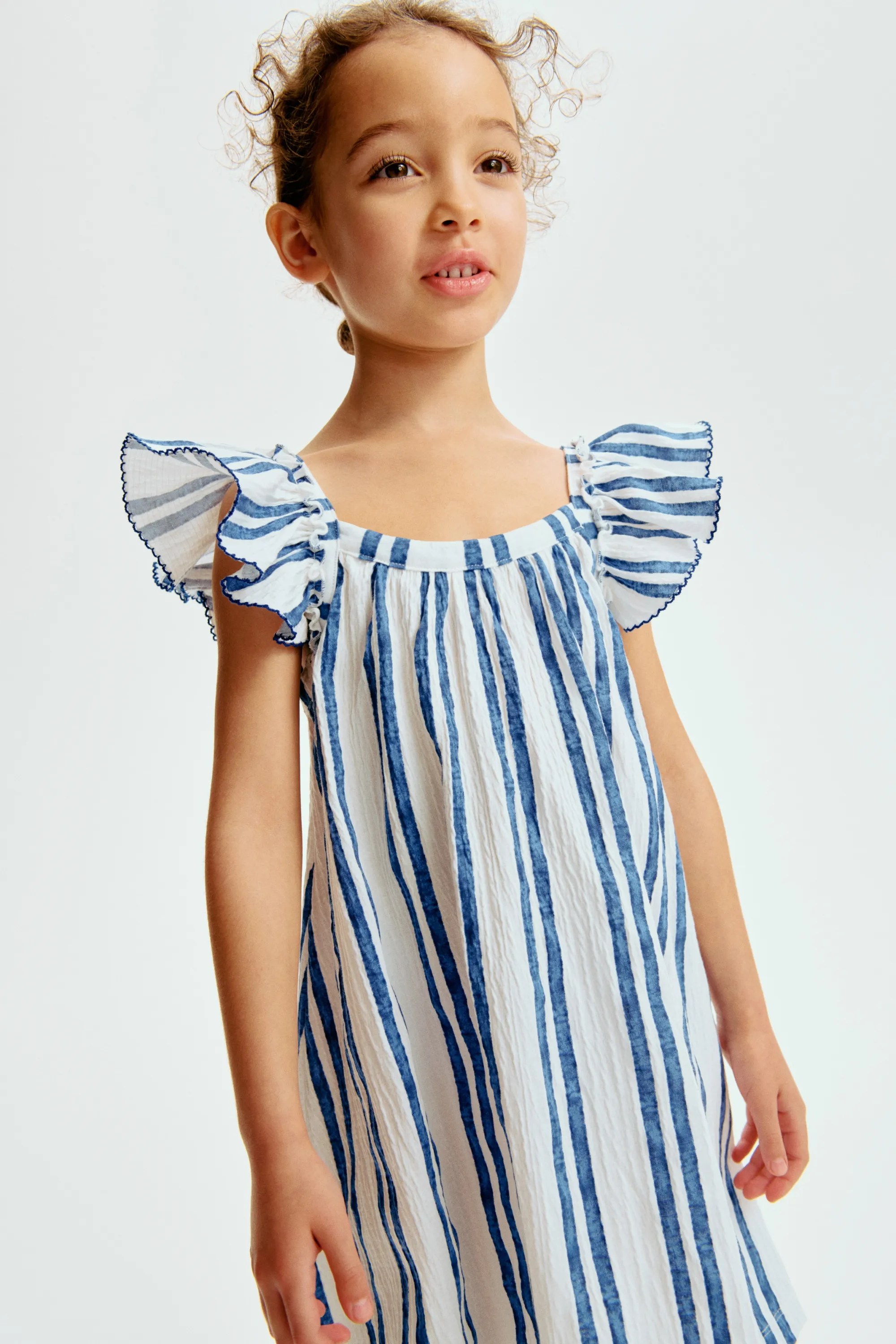 Robe en jersey texturé - Blanc/rayures bleues