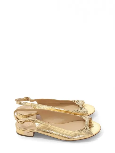 Sandales plates cuir exotique doré Prix boutique 1030€ Taille 38