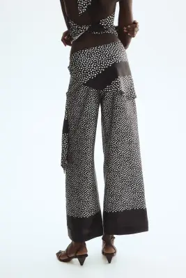 Pantalon avec jupe superposée - Noir/pois — photo 2