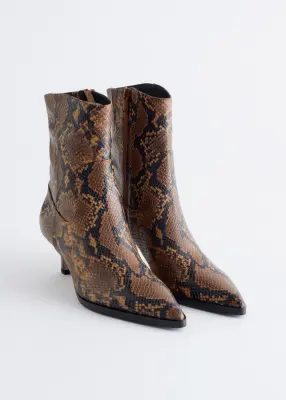 Bottines à petits talons - Motif serpent cognac — photo 1