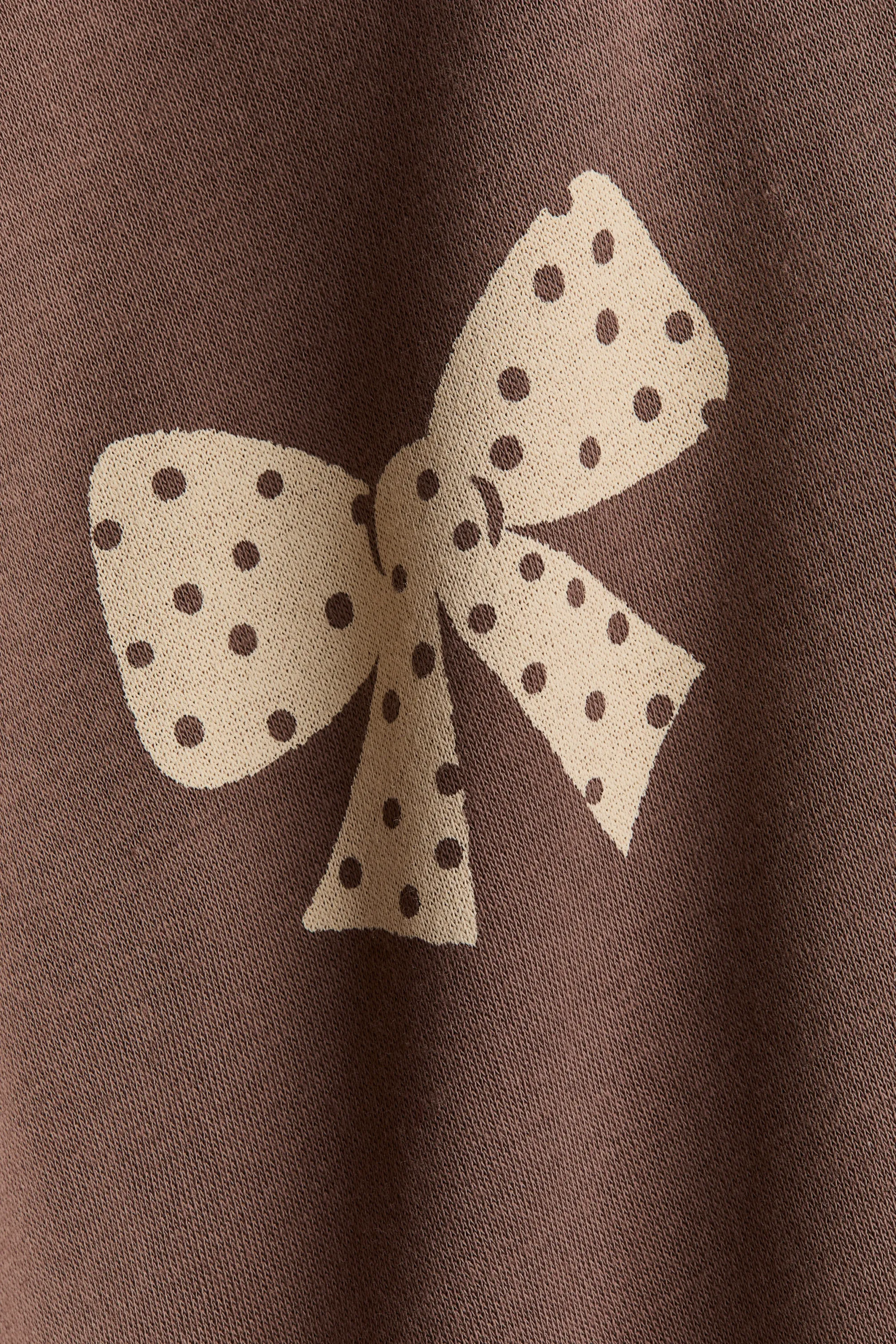 Sweat à motif imprimé avec intérieur brossé - Rose ancien/nœuds