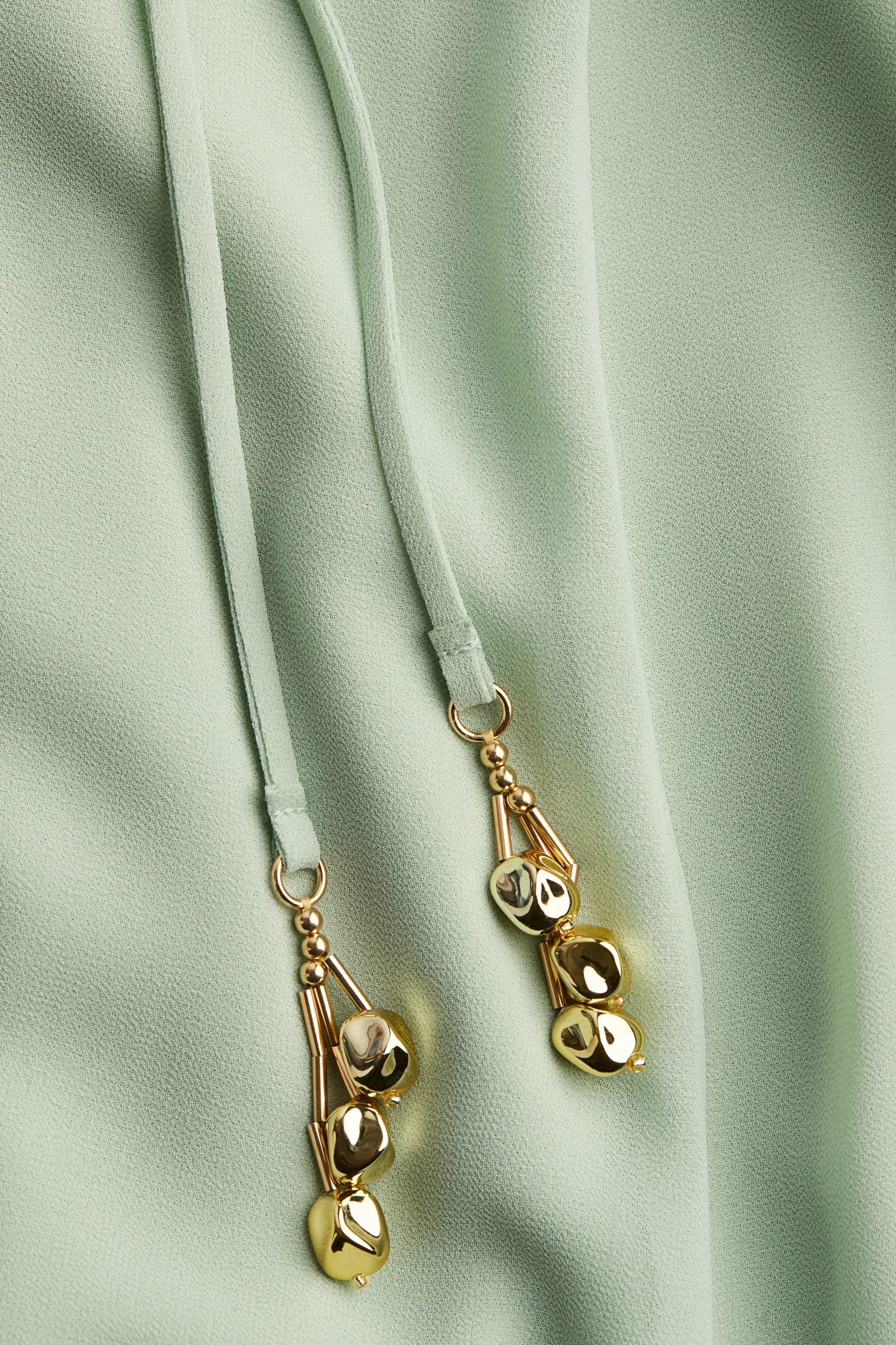 Robe en mousseline avec encolure en V - Vert clair