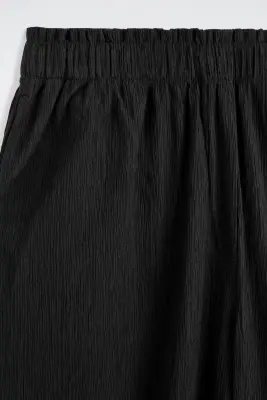 PANTALON LARGE EN JERSEY FROISSÉ - NOIR — photo 5