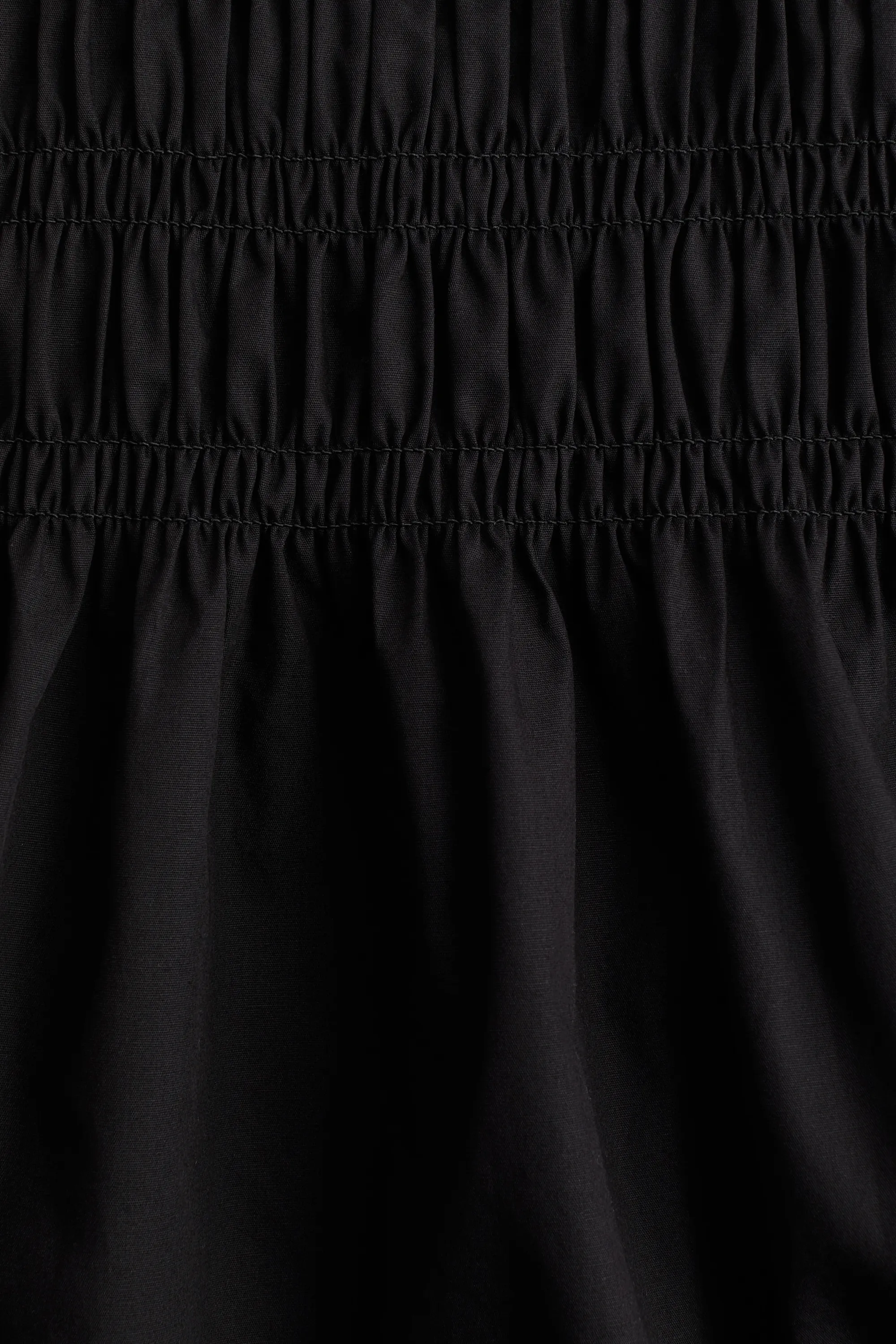 Robe en coton avec corsage smocké - Noir