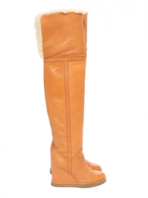 Bottes compensées en cuir camel et shearling blanc Prix boutique 1600€ Taille 37