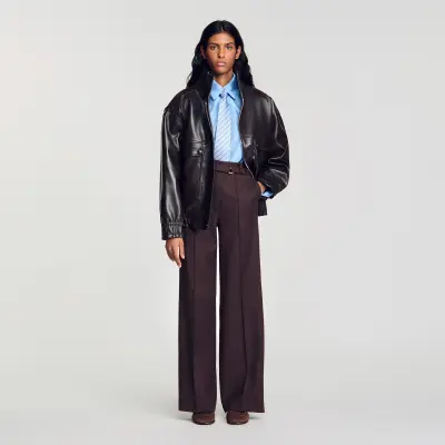 Pantalon à anneaux métalliques