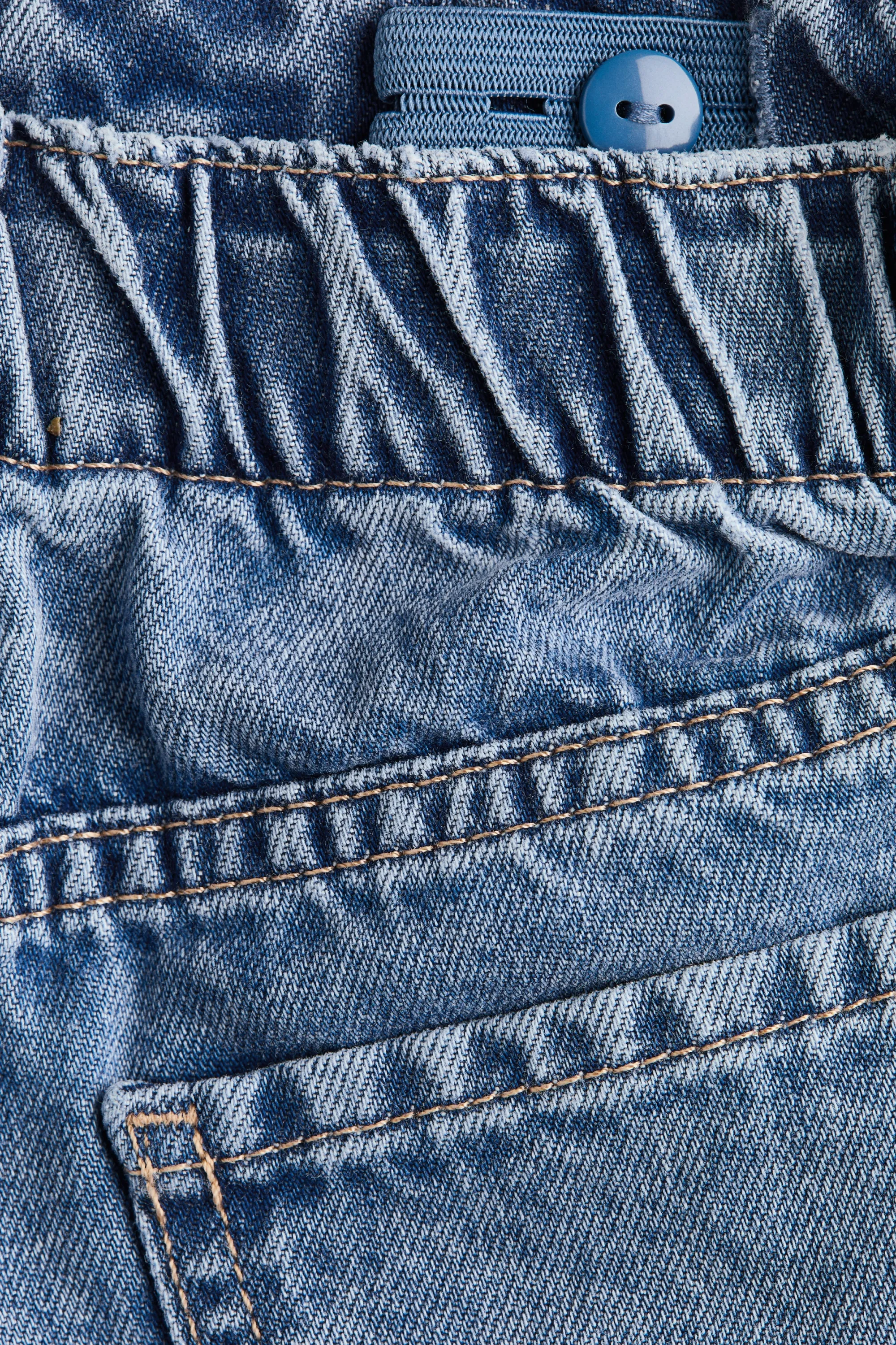 Jean à jambes larges avec motifs - Bleu denim/cerises