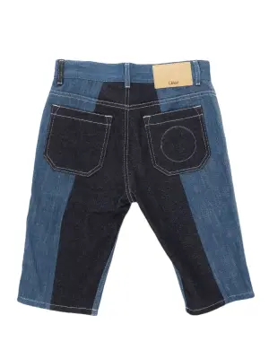 Short bermuda en jean bleu brut et empiècements bleu moyen Px boutique 650€ Taille 36 — photo 3