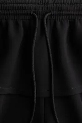 Pantalon en scuba avec jupe superposée - Noir — photo 3