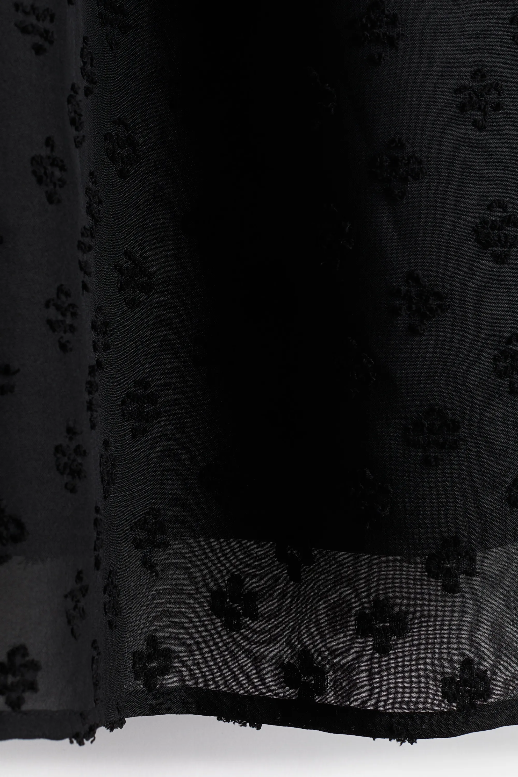 Robe vaporeuse en plumetis - Noir