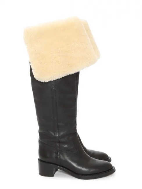 Bottes shearling cuissardes plates en cuir noir Prix Boutique 1600€ Taille 40