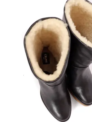 Bottes compensées en cuir noir et shearling blanc Prix boutique 1000€ Taille 36 — photo 4