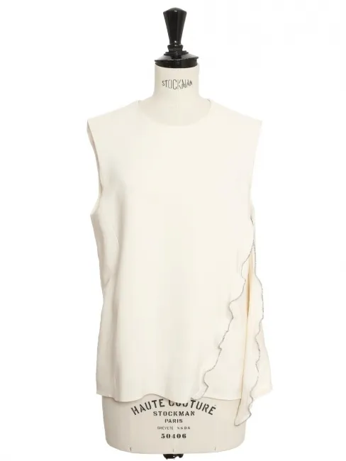 Top col rond sans manche en crêpe de soie 100% blanc crème et zip argent Prix boutique 1300€ Taille S/M