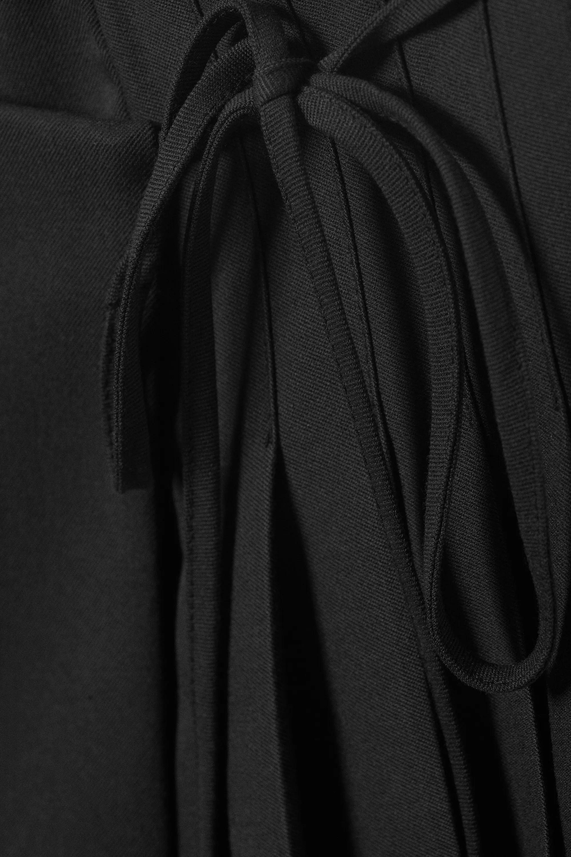 Mini-jupe portefeuille plissée taille basse - Noir