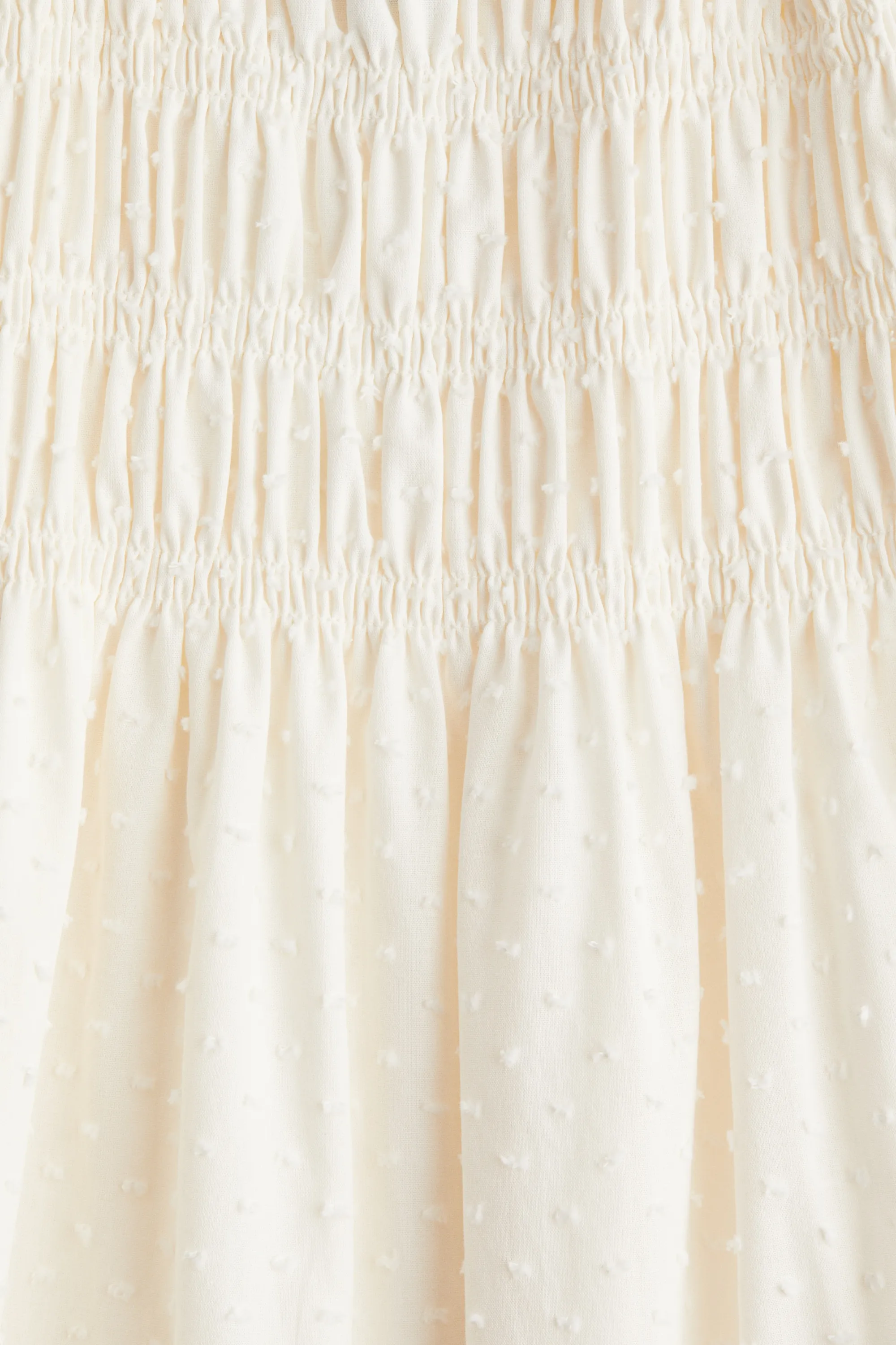 Robe en coton avec corsage smocké - Crème