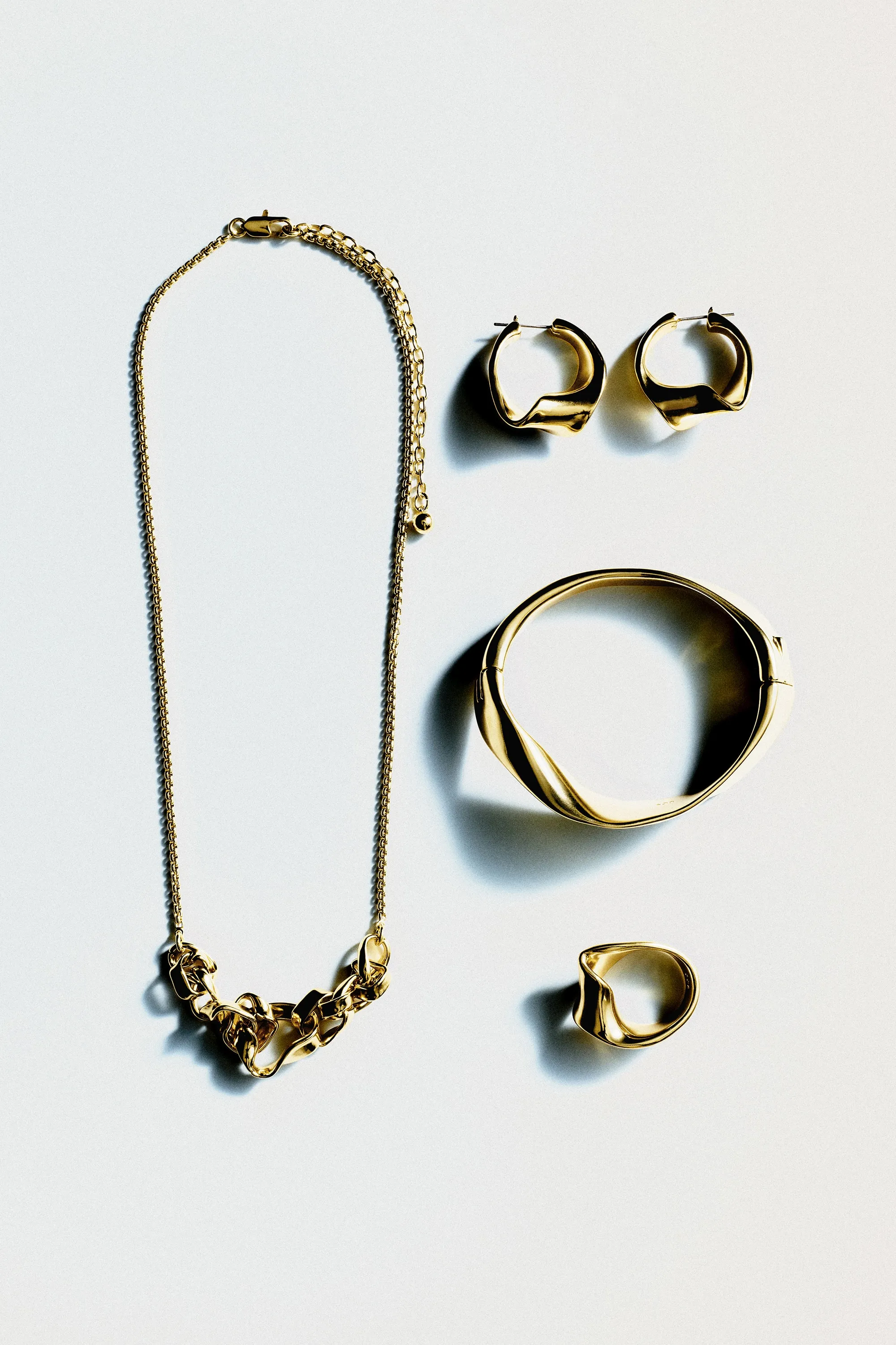 COLLIER FAÇON RUBAN TORSADÉ - DORÉ