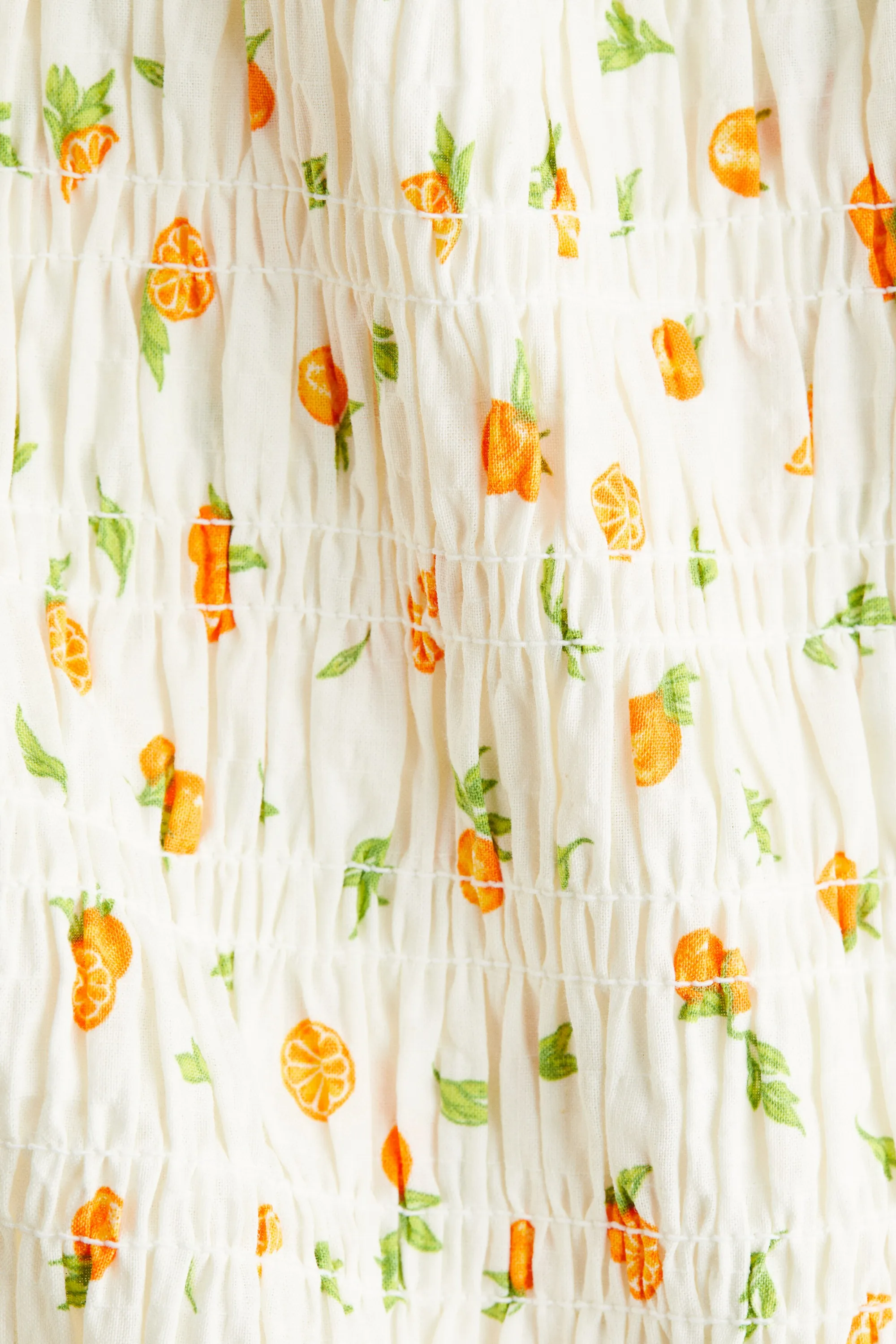 Blouse smockée - Crème/oranges