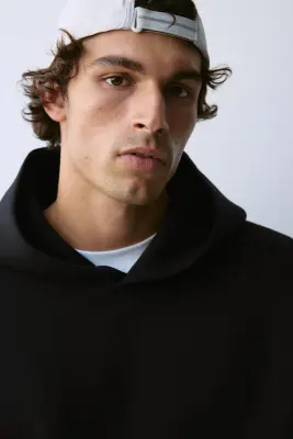 Hoodie de sport Oversized Fit DryMove™ - Noir — photo 1