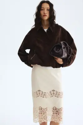Jupe en coton avec broderies - Beige clair — photo 1