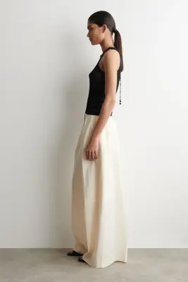 PLEATED MODAL WIDE-LEG TROUSERS - CRÈME — photo 1
