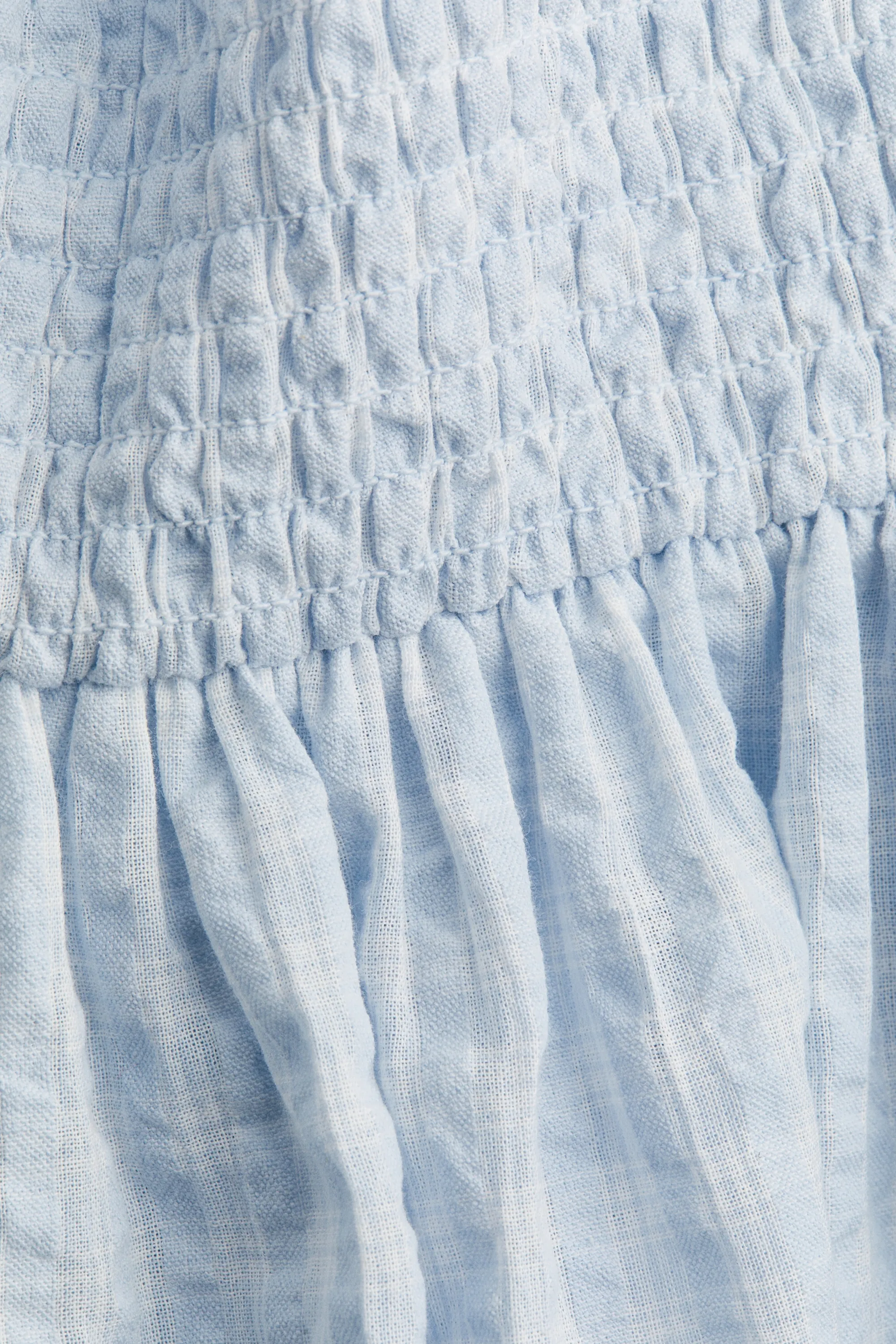 Robe smockée en seersucker - Bleu clair/carreaux