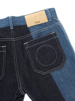 Short bermuda en jean bleu brut et empiècements bleu moyen Px boutique 650€ Taille 36 — photo 4