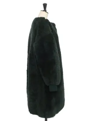 Manteau shearling en peau retournée vert foncé Prix boutique 6650$ Taille 36 — photo 4