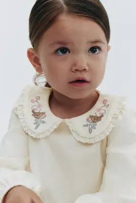 Blouse en coton avec détails brodés - Crème — photo 2