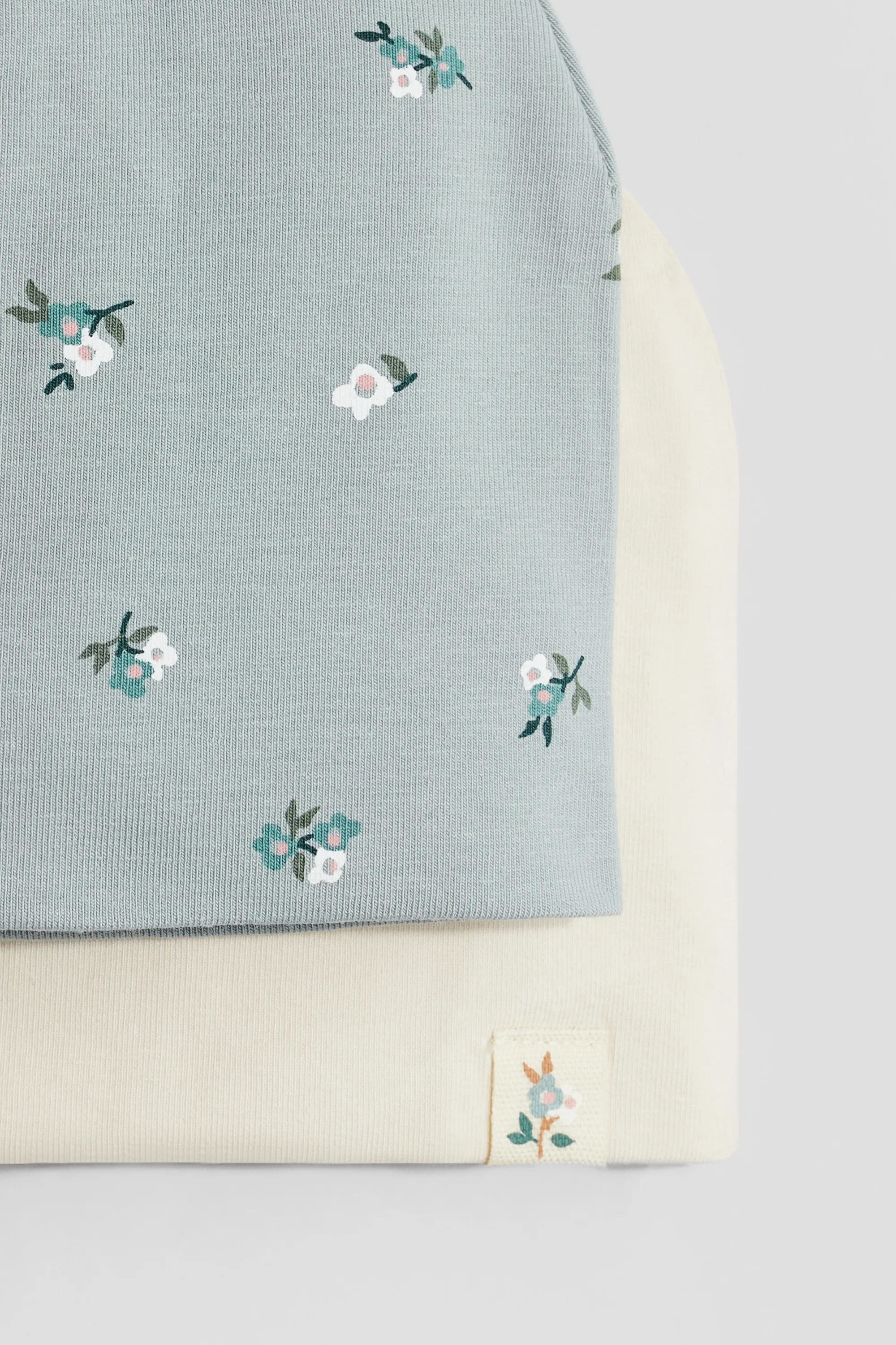 Lot de 2 bonnets en jersey de coton - Turquoise/fleuri