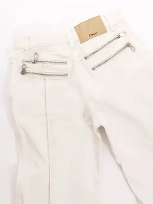 Jean flared en denim blanc zip argent Prix boutique 1215€ Taille 38/40 — photo 2