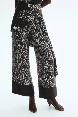Pantalon avec jupe superposée - Noir/pois — photo 1