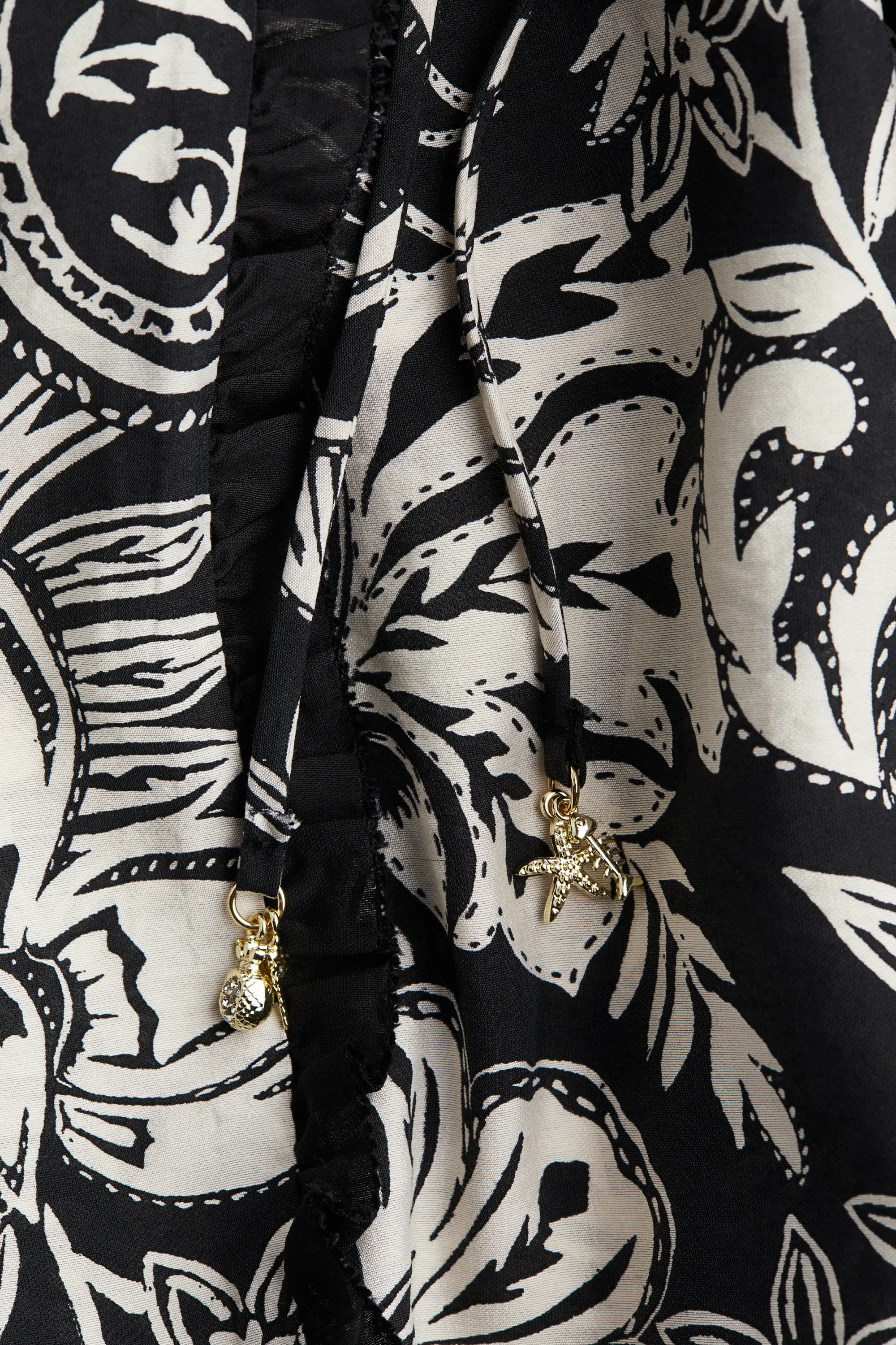 Robe tunique à manches trompette - Noir/fleuri