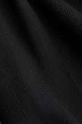 Pantalon avec taille élastique et jambes ballon - Noir — photo 5