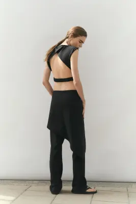 Pantalon chic avec jupe superposée - Noir — photo 4