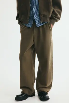 Pantalon Relaxed Fit en molleton de coton - Vert kaki foncé — photo 1
