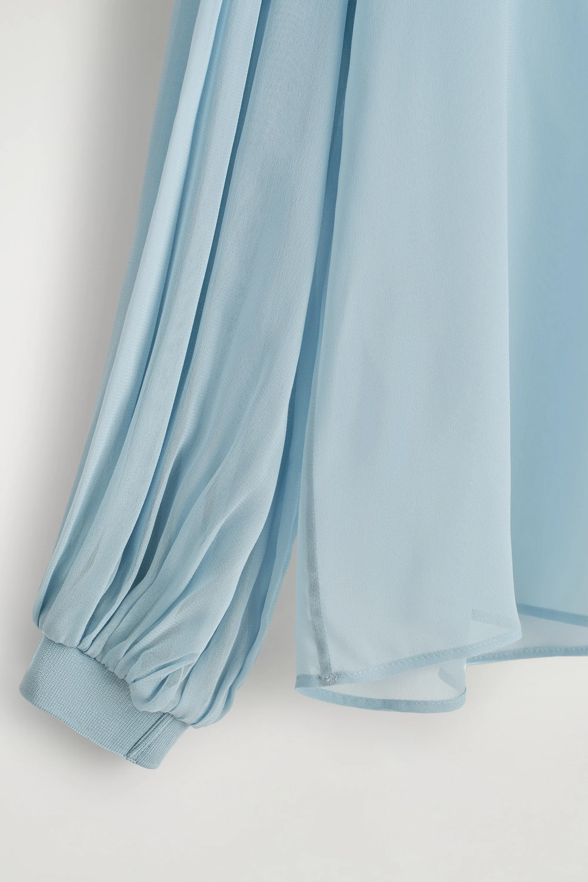 BLOUSE DIAPHANE À MANCHES BALLON - BLEU CIEL