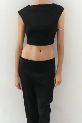 Pantalon chic avec jupe superposée - Noir — photo 2
