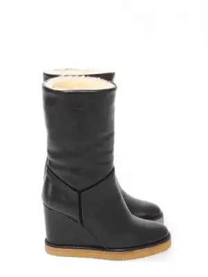 Bottes compensées en cuir noir et shearling blanc Prix boutique 1000€ Taille 36 — photo 1